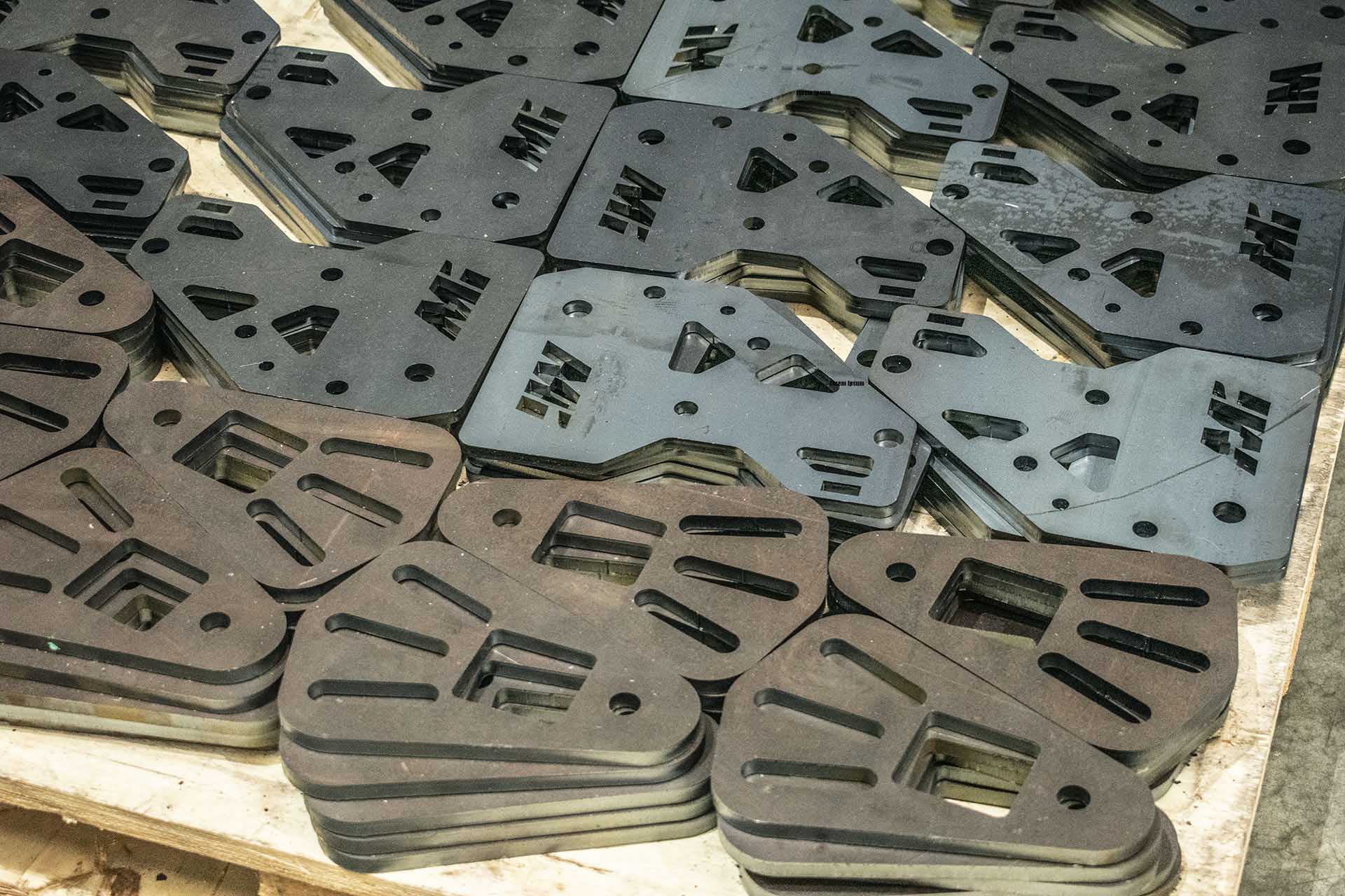 Custom laser-cut steel plates and brackets fabricated by MiWeld